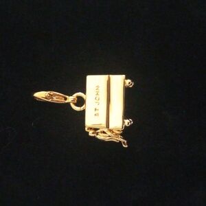 ST JOHN Vintage Logo Gold-Tone Charm